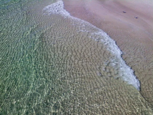 Emerald water off the Russell-Fields City Pier