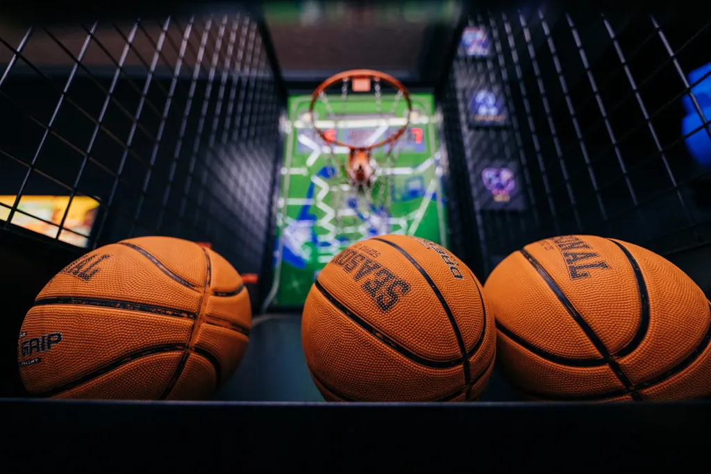 Basketballs ready at the arcade hoops