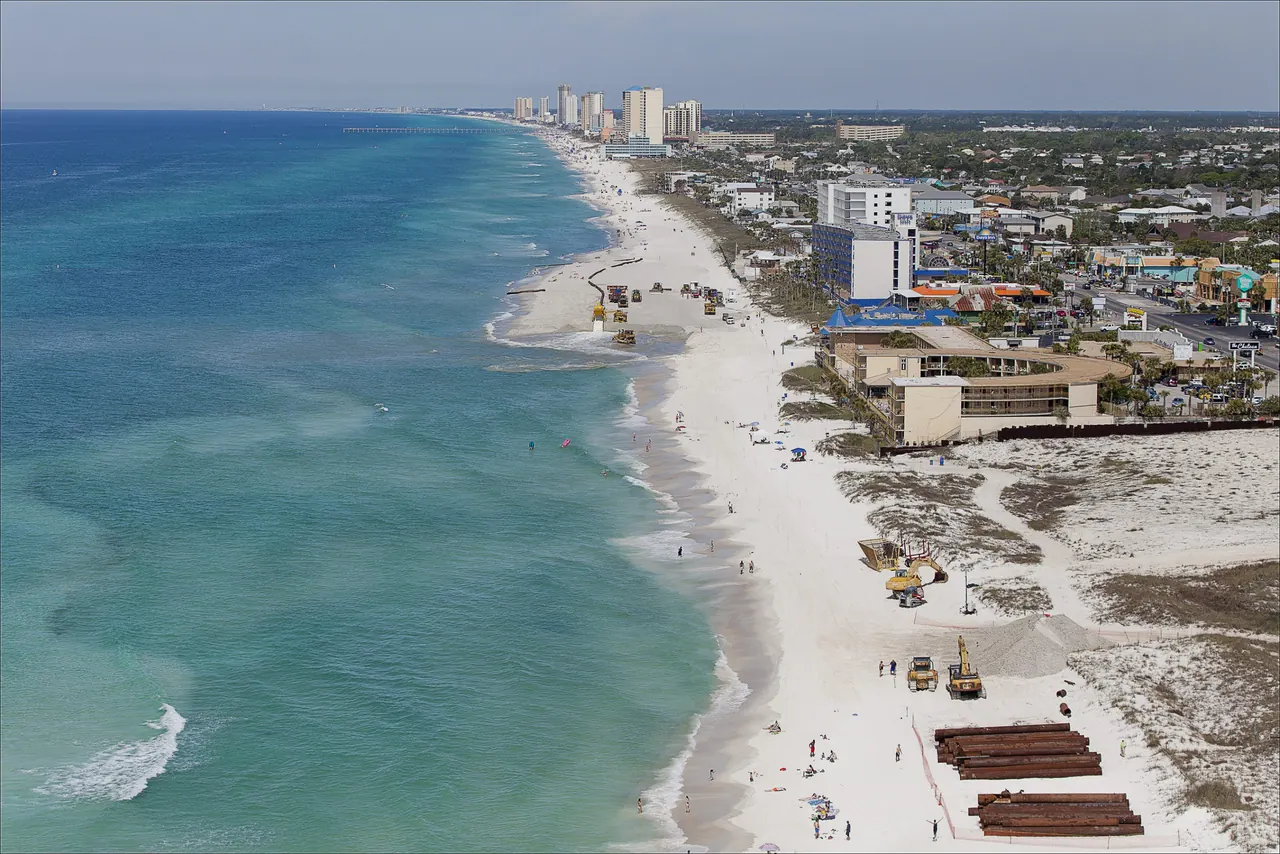 Panama City Beach shoreline with white sand and emerald water