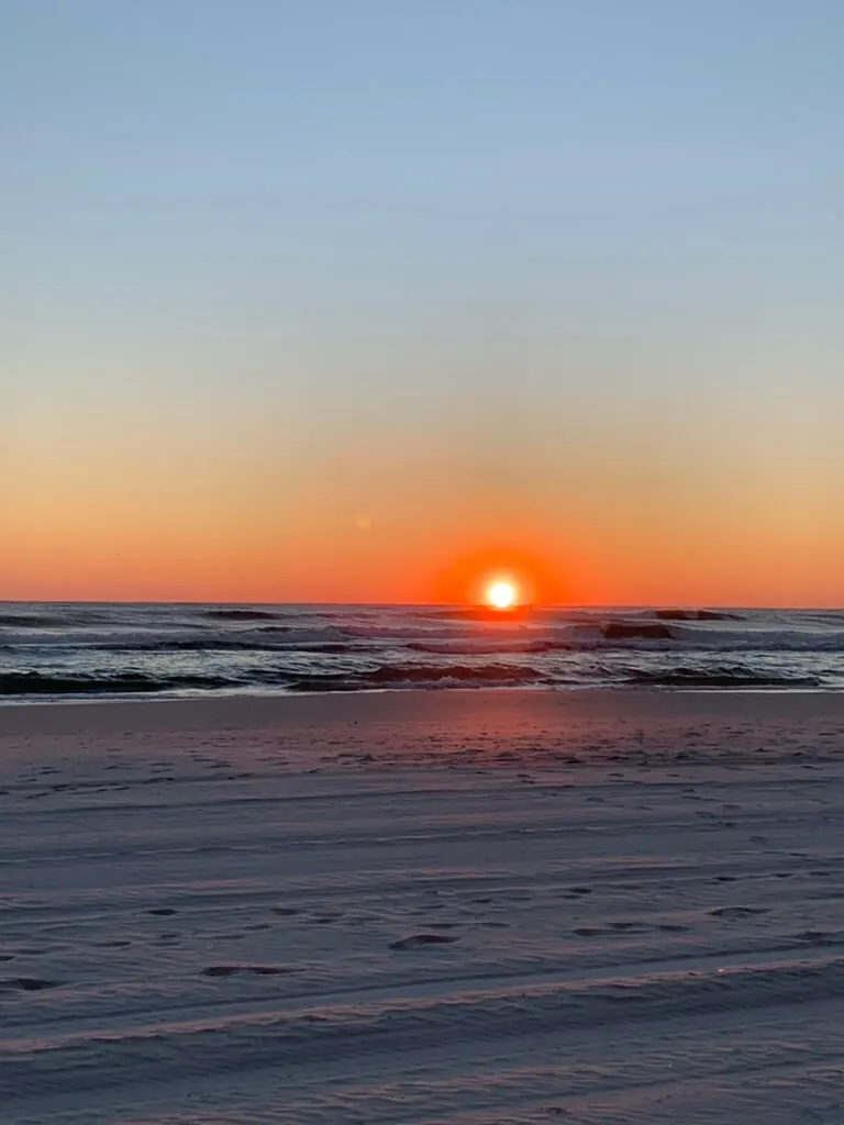 Sun setting into the Gulf of Mexico at Panama City Beach