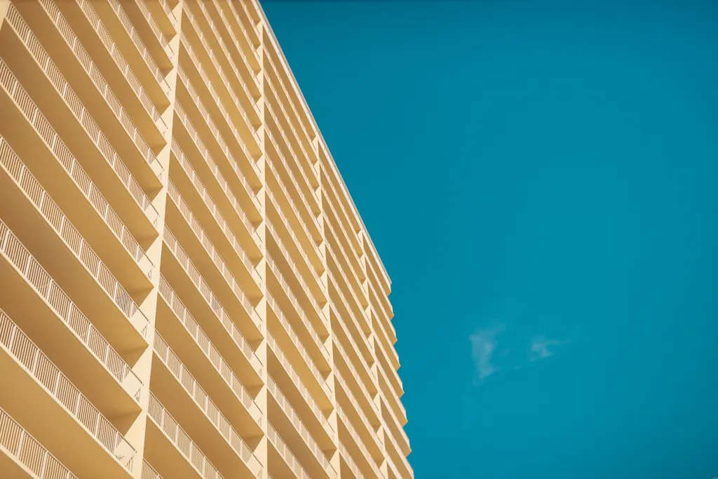Gulf Crest tower balconies against a deep blue sky