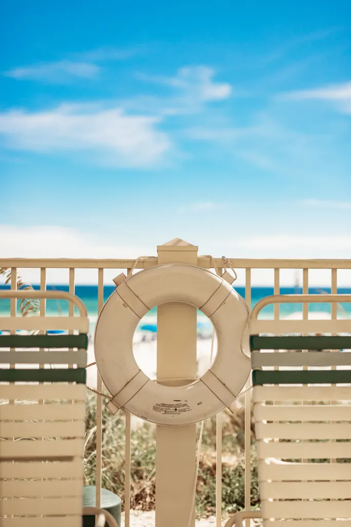 Life ring at the beach gate with the Gulf behind